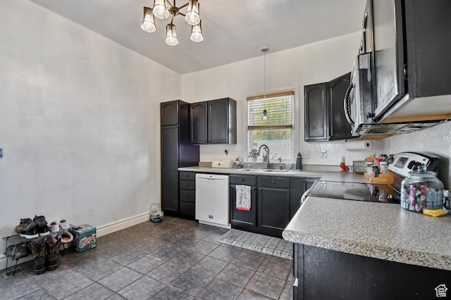 kitchen featuring dishwasher, electric range, a sink, a chandelier, and light countertops
