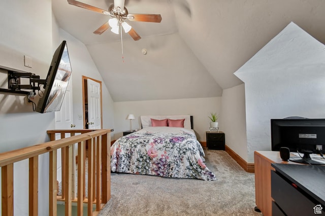carpeted bedroom with lofted ceiling, baseboards, and ceiling fan