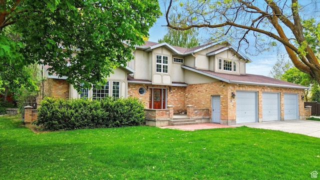 view of front of home featuring stucco siding, a front lawn, driveway, and brick siding
