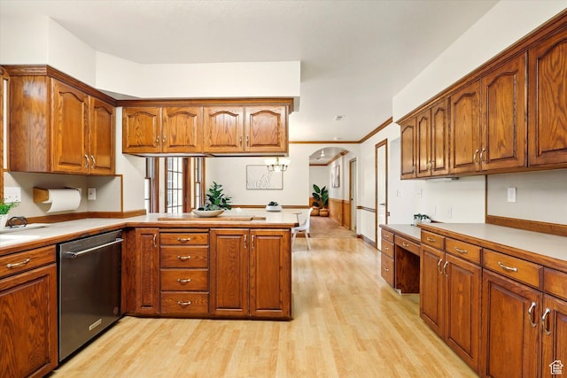 kitchen featuring dishwasher, light wood-style flooring, brown cabinets, and a peninsula