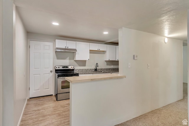 1145 S 350 W, Orem, UT 84058 - kitchen with stainless steel electric range, a sink, white cabinets, recessed lighting, and baseboards