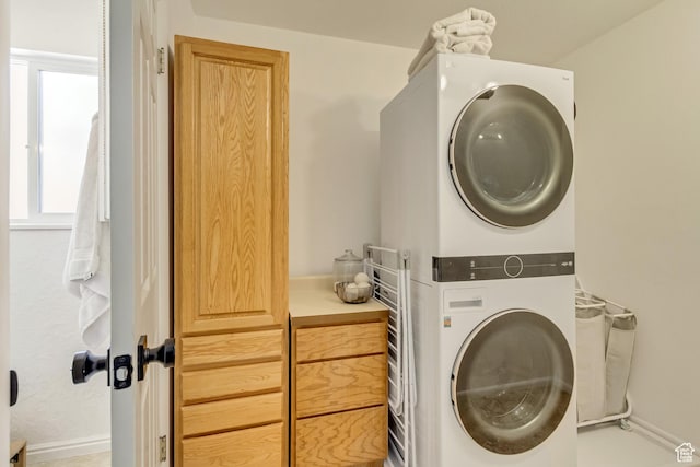 1145 S 350 W, Orem, UT 84058 - washroom with stacked washer / dryer and baseboards