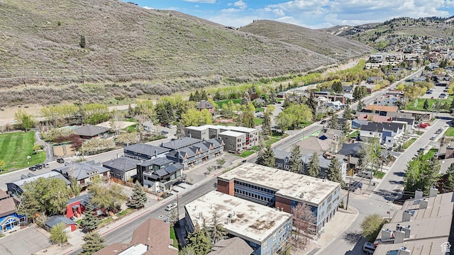 aerial perspective of suburban area featuring a mountain backdrop