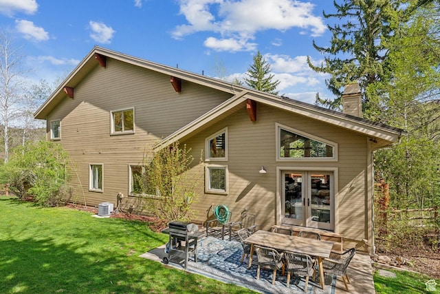 3339 W Big Spruce Way, Park City, UT 84098 - rear view of property with a chimney, a lawn, a patio area, french doors, and central AC
