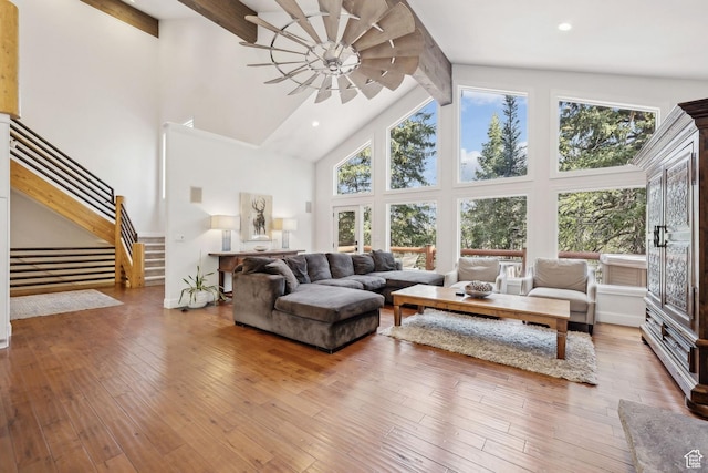 3339 W Big Spruce Way, Park City, UT 84098 - living room featuring beam ceiling, plenty of natural light, high vaulted ceiling, hardwood / wood-style floors, and a ceiling fan