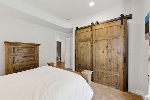 3339 W Big Spruce Way, Park City, UT 84098 - carpeted bedroom with a barn door and recessed lighting