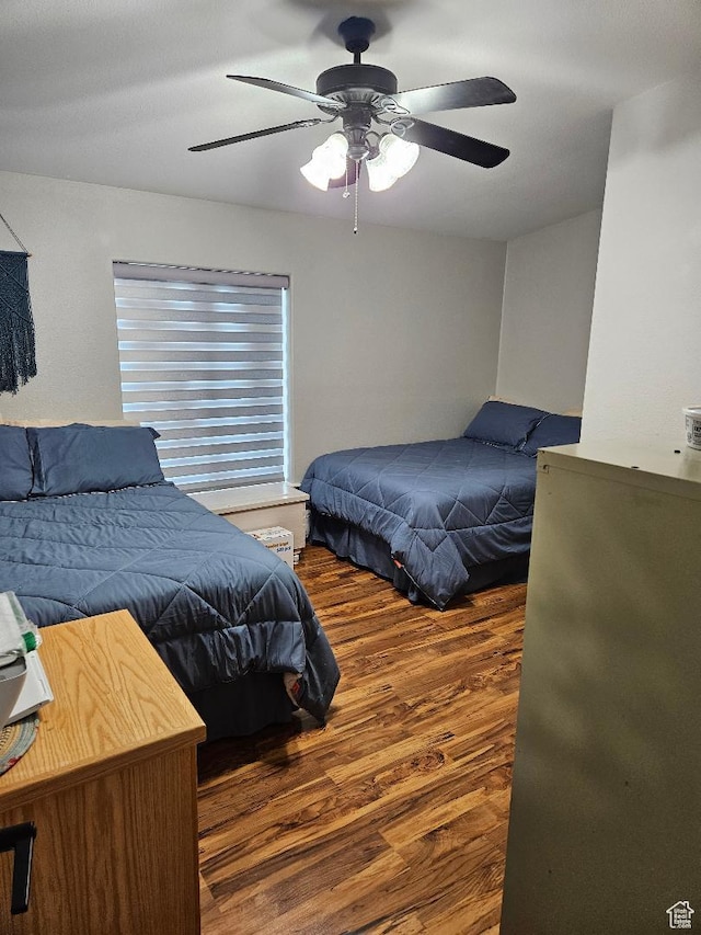 550 S Stump Hollow Rd, Garden City, UT 84028 - bedroom featuring wood finished floors and ceiling fan