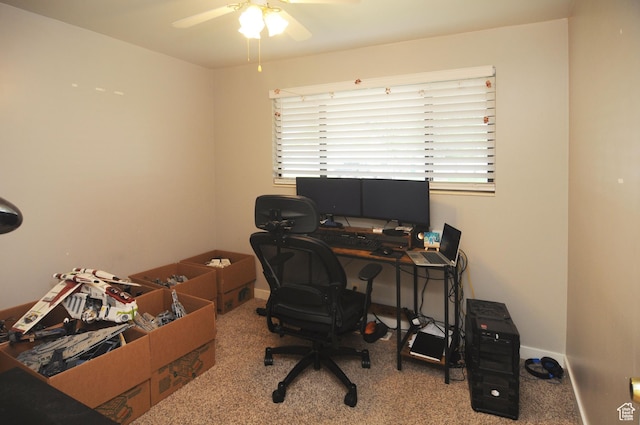 office space featuring ceiling fan, carpet, and baseboards