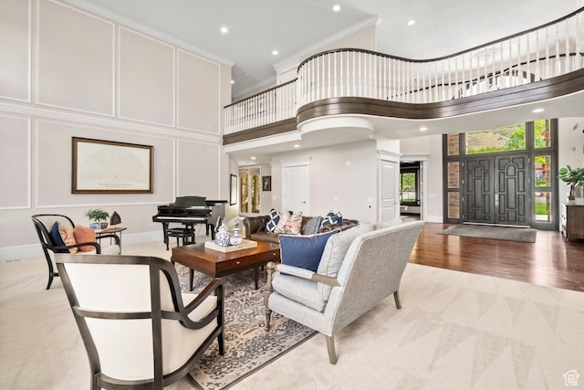 1971 Summerwood Dr, Farmington, UT 84025 - living room featuring light colored carpet, crown molding, a towering ceiling, recessed lighting, and baseboards