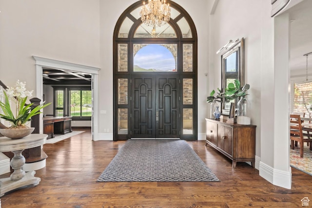1971 Summerwood Dr, Farmington, UT 84025 - foyer entrance with a chandelier, a high ceiling, wood-type flooring, and baseboards