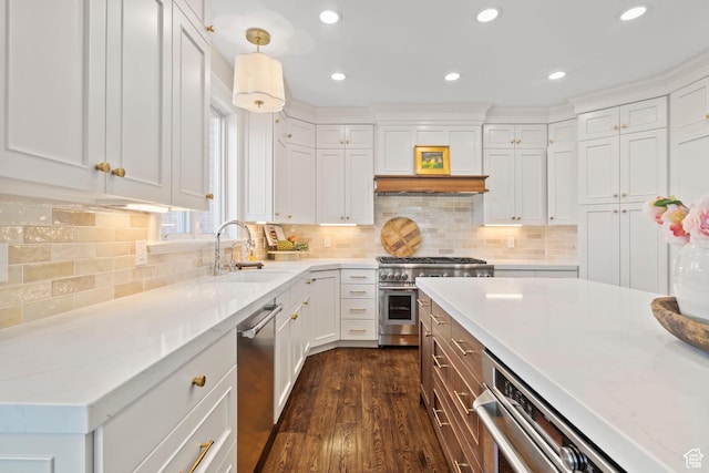 1971 Summerwood Dr, Farmington, UT 84025 - kitchen featuring appliances with stainless steel finishes, a sink, dark wood finished floors, white cabinets, and recessed lighting