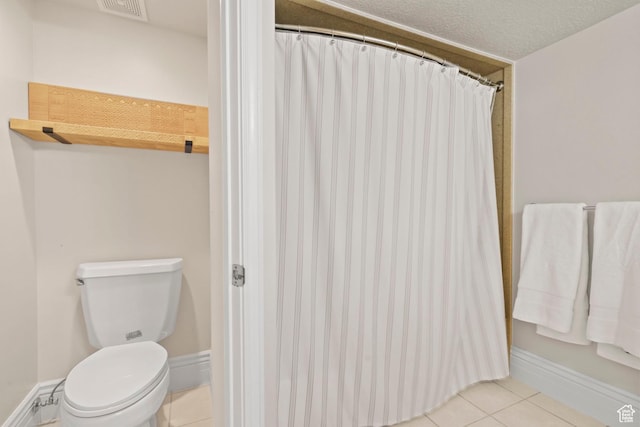 1971 Summerwood Dr, Farmington, UT 84025 - bathroom featuring tile patterned flooring, toilet, a shower with curtain, and baseboards