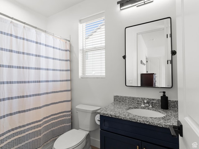 full bath with vanity, toilet, and a shower with curtain