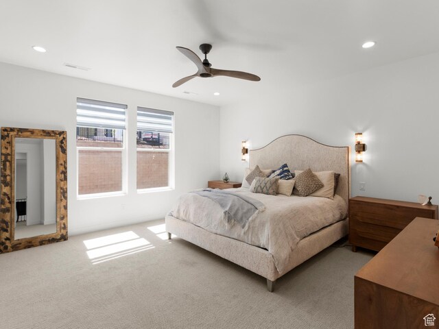 carpeted bedroom featuring recessed lighting and ceiling fan