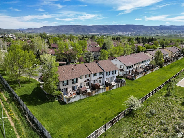 aerial perspective of suburban area with a mountain backdrop
