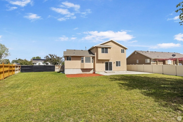 back of house featuring a patio area and stucco siding