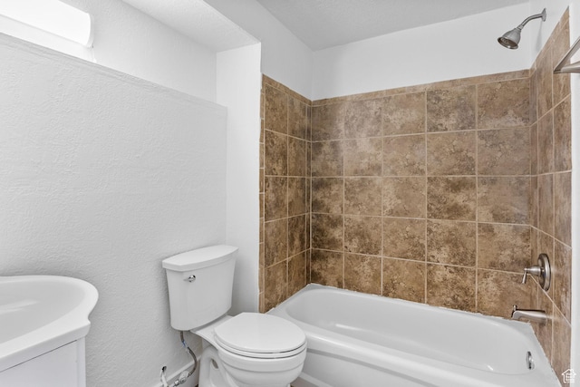 full bathroom featuring toilet, shower / bath combination, and vanity