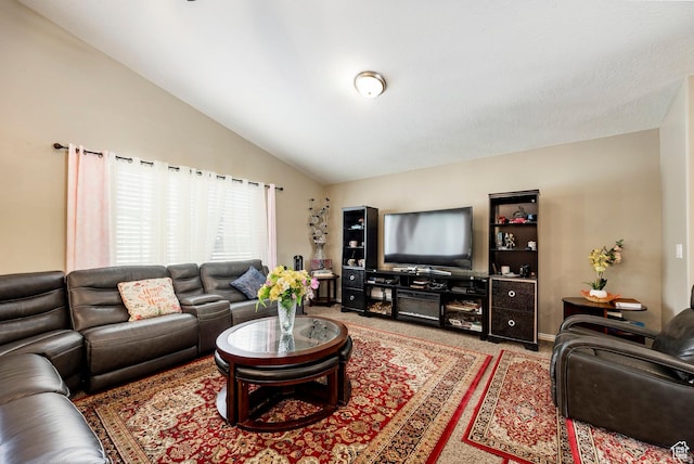 living area featuring lofted ceiling