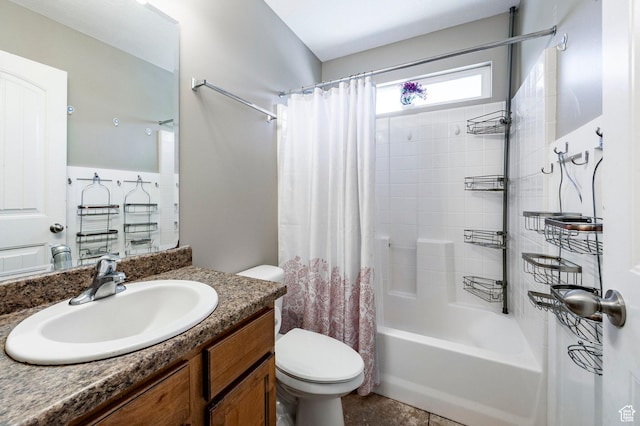bathroom featuring toilet, shower / bathtub combination with curtain, and vanity