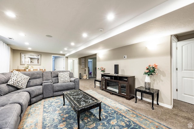 living room with carpet flooring, recessed lighting, and baseboards