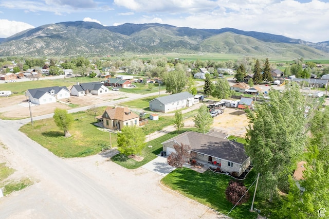 aerial view of residential area with a mountainous background