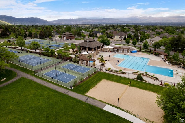 81 E Lone Hollow Dr S, Sandy, UT 84092 - aerial perspective of suburban area featuring a pool and a mountainous background