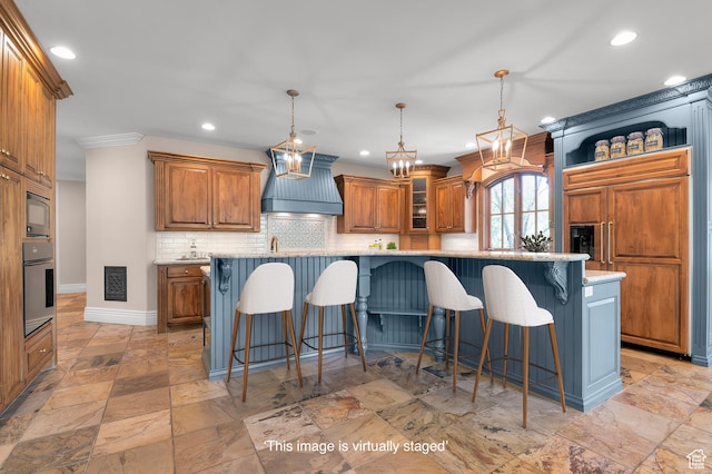 81 E Lone Hollow Dr S, Sandy, UT 84092 - kitchen featuring premium range hood, built in appliances, recessed lighting, a breakfast bar, and brown cabinetry