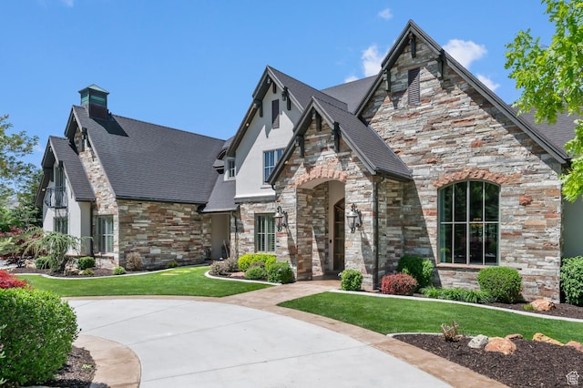 81 E Lone Hollow Dr S, Sandy, UT 84092 - view of front of house with stone siding, a front yard, stucco siding, and a chimney