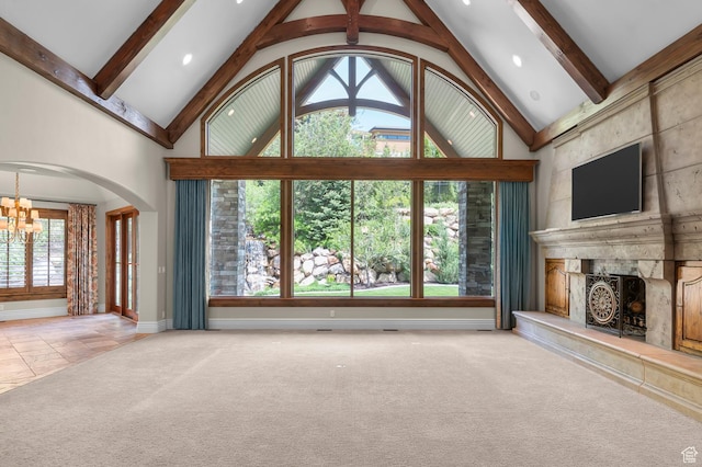 81 E Lone Hollow Dr S, Sandy, UT 84092 - unfurnished living room with a chandelier, a fireplace, carpet flooring, beamed ceiling, and baseboards