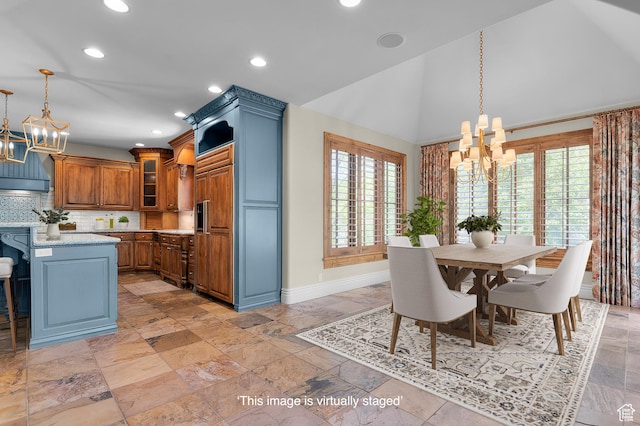 81 E Lone Hollow Dr S, Sandy, UT 84092 - dining area featuring a chandelier, baseboards, recessed lighting, high vaulted ceiling, and stone tile flooring