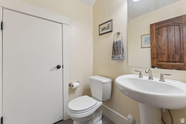 13312 N Highmark Ct, Kamas, UT 84036 - bathroom featuring a sink, toilet, and baseboards