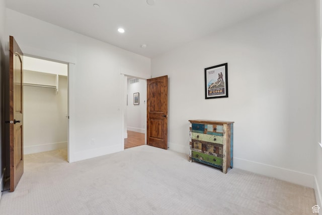 13312 N Highmark Ct, Kamas, UT 84036 - unfurnished bedroom featuring carpet floors, baseboards, a walk in closet, and recessed lighting