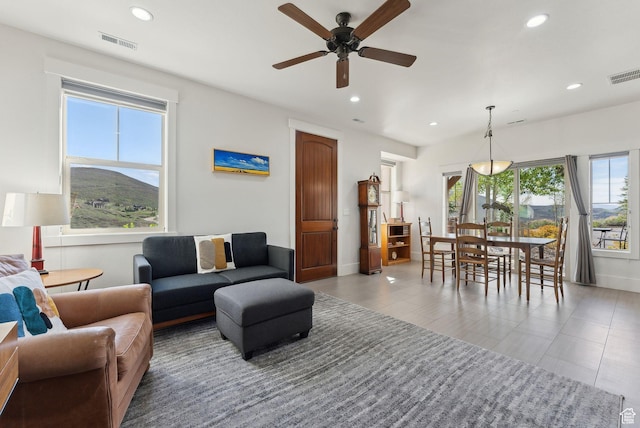 13312 N Highmark Ct, Kamas, UT 84036 - living area featuring plenty of natural light, recessed lighting, ceiling fan, and baseboards