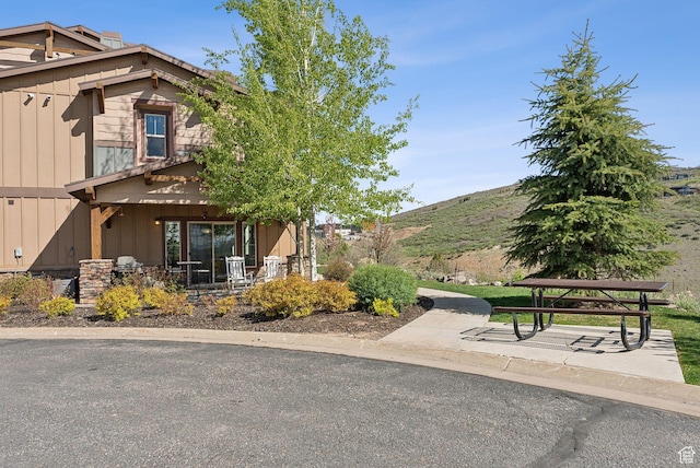 13312 N Highmark Ct, Kamas, UT 84036 - view of side of property featuring board and batten siding and a mountain view