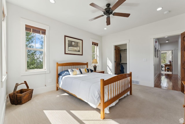 13312 N Highmark Ct, Kamas, UT 84036 - bedroom with carpet flooring, multiple windows, recessed lighting, a spacious closet, and baseboards