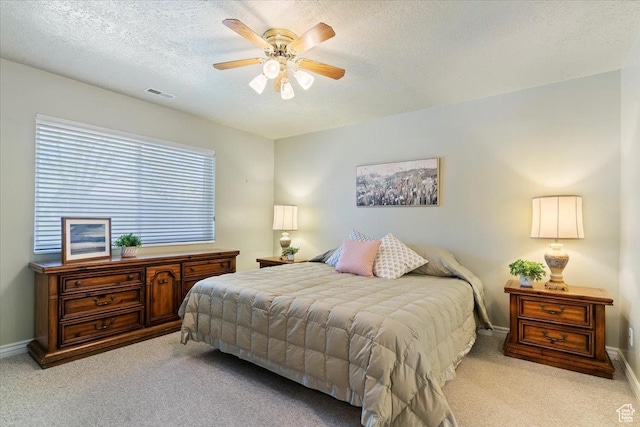 269 River Cove Dr, Morgan, UT 84050 - carpeted bedroom with a textured ceiling, baseboards, and a ceiling fan