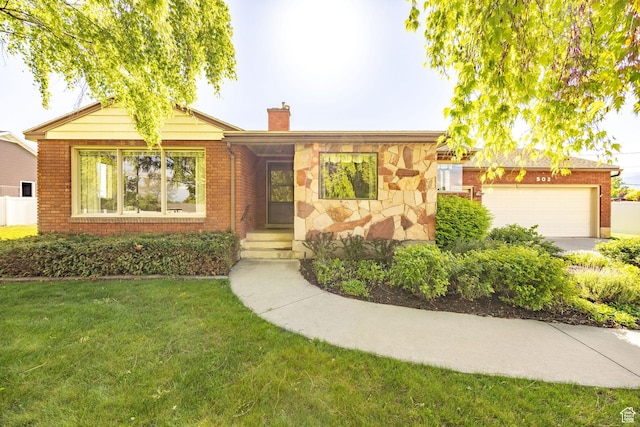 single story home featuring a chimney, a garage, a front lawn, brick siding, and stone siding