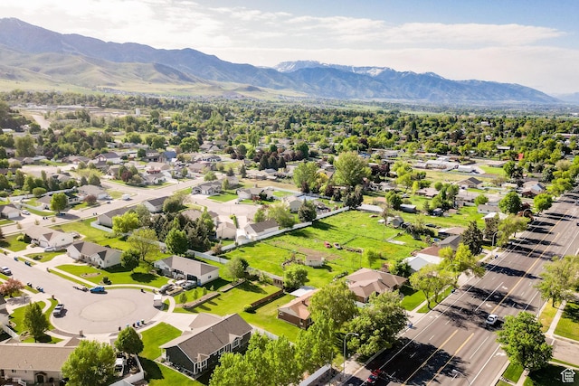 aerial perspective of suburban area featuring a mountainous background