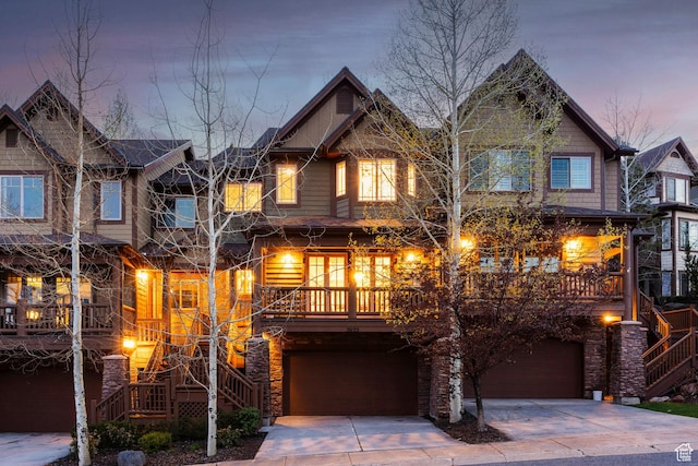 3033 Canyon Links Dr, Park City, UT 84098 - craftsman inspired home featuring stairway, an attached garage, driveway, and stone siding