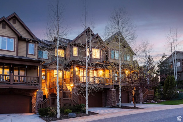3033 Canyon Links Dr, Park City, UT 84098 - craftsman inspired home with stairway, a garage, and stone siding