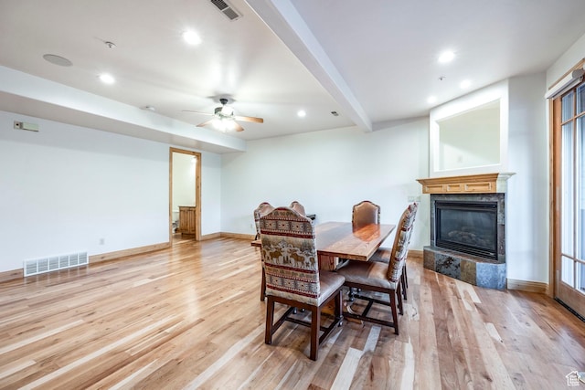 3033 Canyon Links Dr, Park City, UT 84098 - dining room featuring light wood-style flooring, a fireplace, recessed lighting, ceiling fan, and beam ceiling