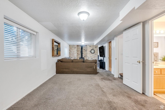 255 E 1230 N, Springville, UT 84663 - carpeted living area with a textured ceiling, a wood stove, and baseboards