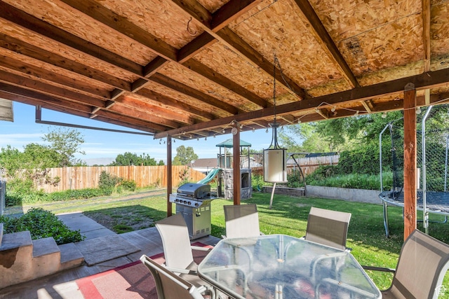 255 E 1230 N, Springville, UT 84663 - view of patio with a trampoline, a playground, area for grilling, and outdoor dining area