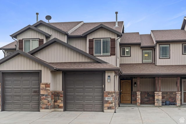 1563 N 450 E, North Ogden, UT 84404 - multi unit property with a shingled roof, concrete driveway, and stone siding