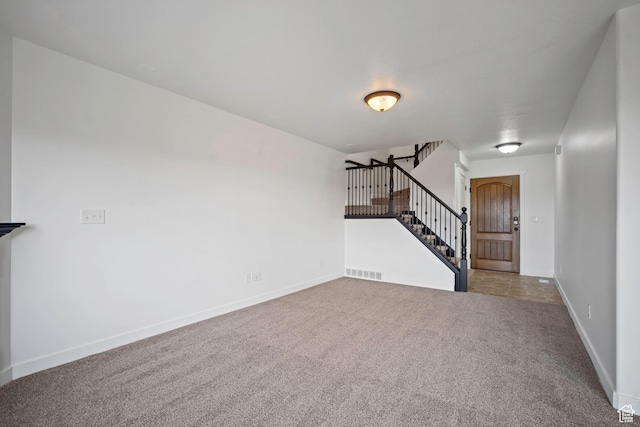 1563 N 450 E, North Ogden, UT 84404 - unfurnished living room featuring stairway, carpet floors, and baseboards