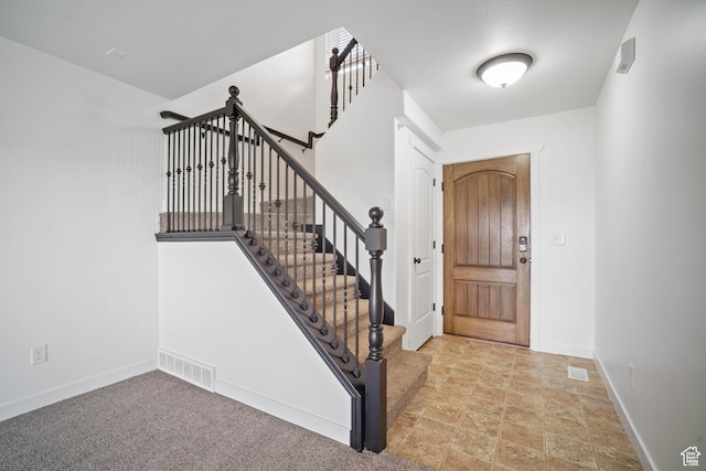 1563 N 450 E, North Ogden, UT 84404 - entryway with baseboards, stairs, and stone finish floors
