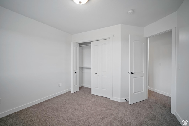 1563 N 450 E, North Ogden, UT 84404 - unfurnished bedroom featuring carpet floors, a closet, and baseboards