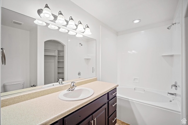 1563 N 450 E, North Ogden, UT 84404 - full bathroom featuring bathing tub / shower combination, vanity, toilet, a spacious closet, and recessed lighting