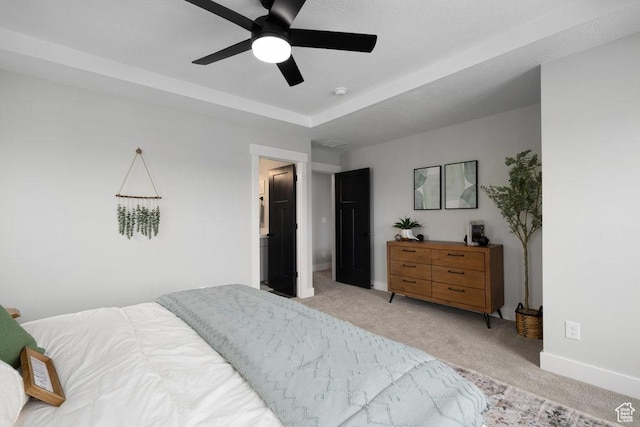 3478 S Wick Ct Unit 61, South Salt Lake, UT 84115 - bedroom featuring light carpet, baseboards, and a ceiling fan