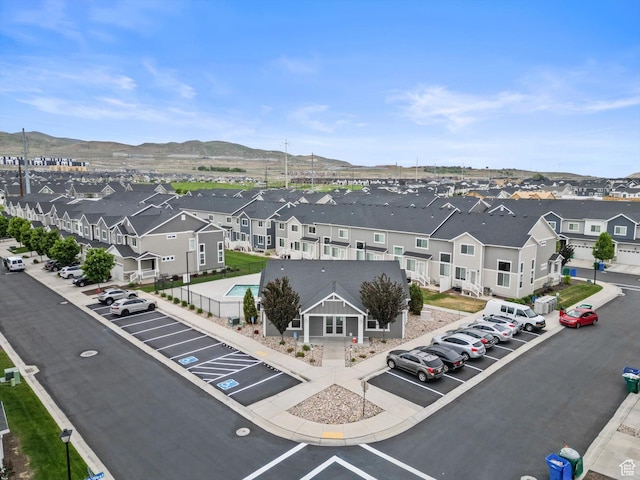 aerial view of residential area with a mountain backdrop